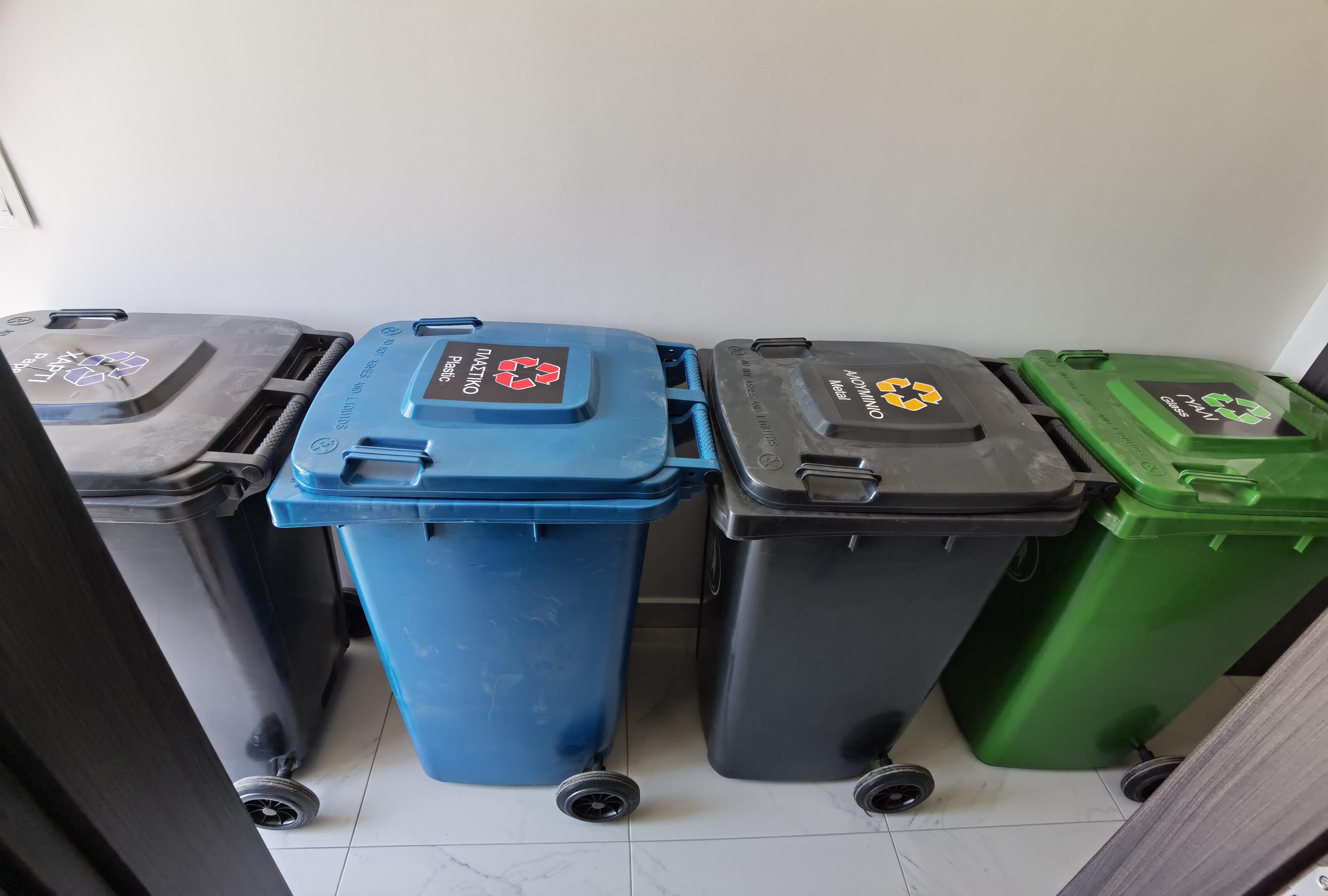 a group of garbage cans
