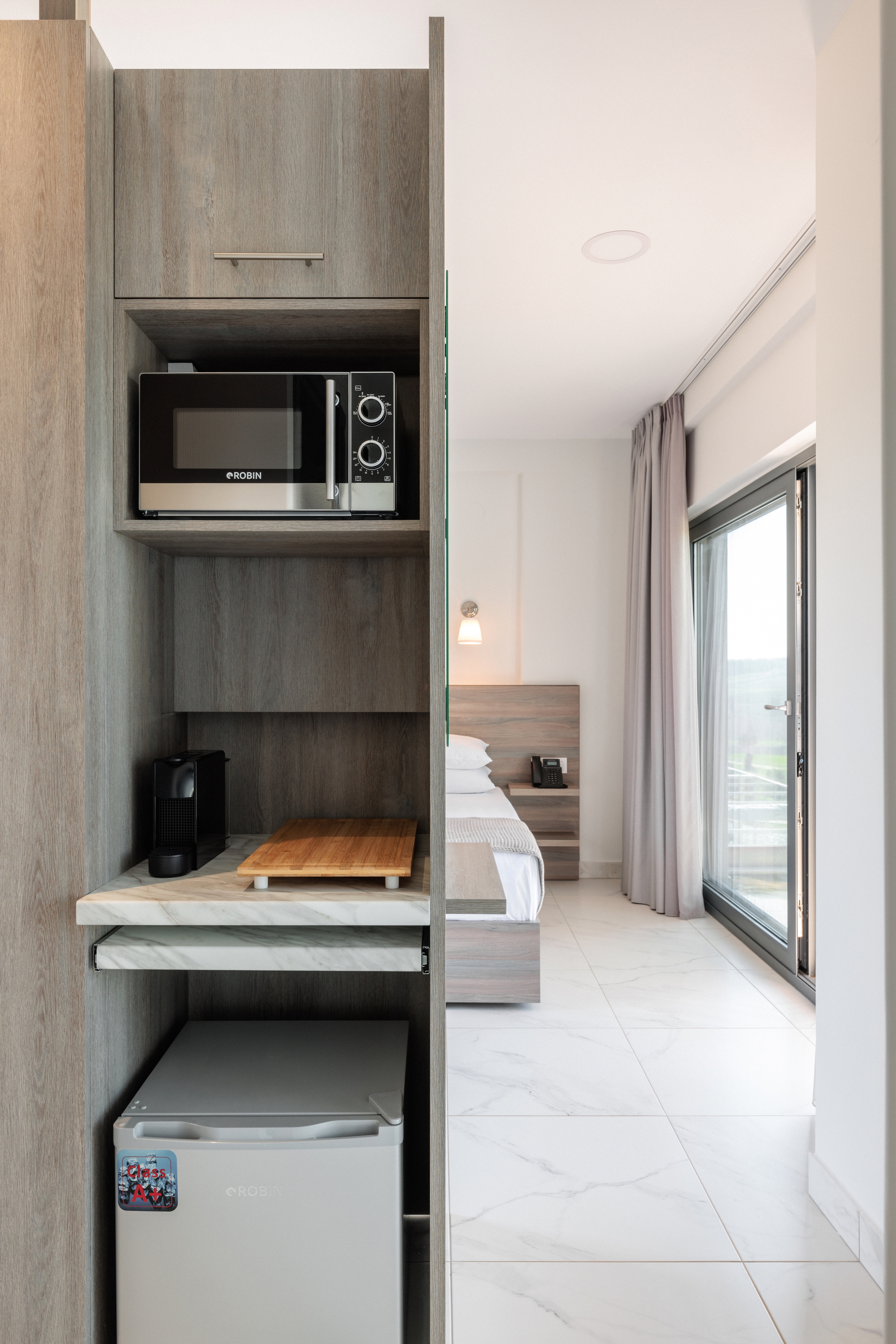 a kitchen with a microwave oven