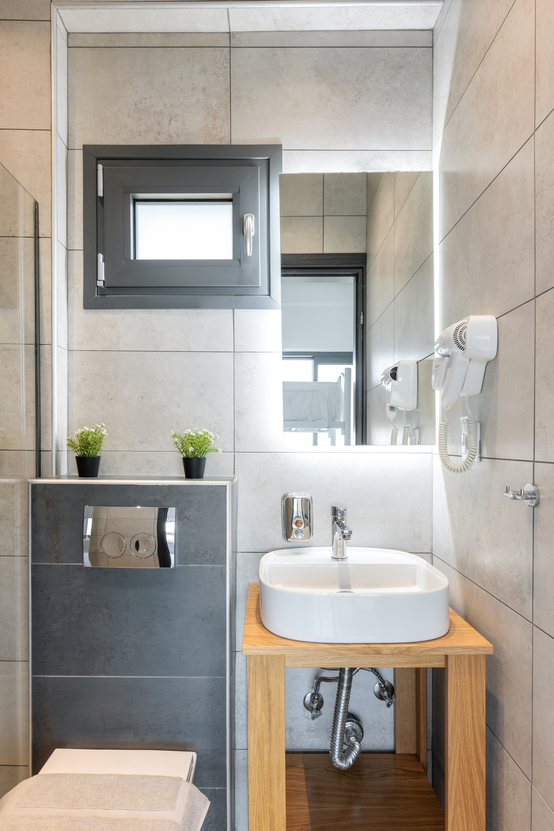 a bathroom with a sink and mirror
