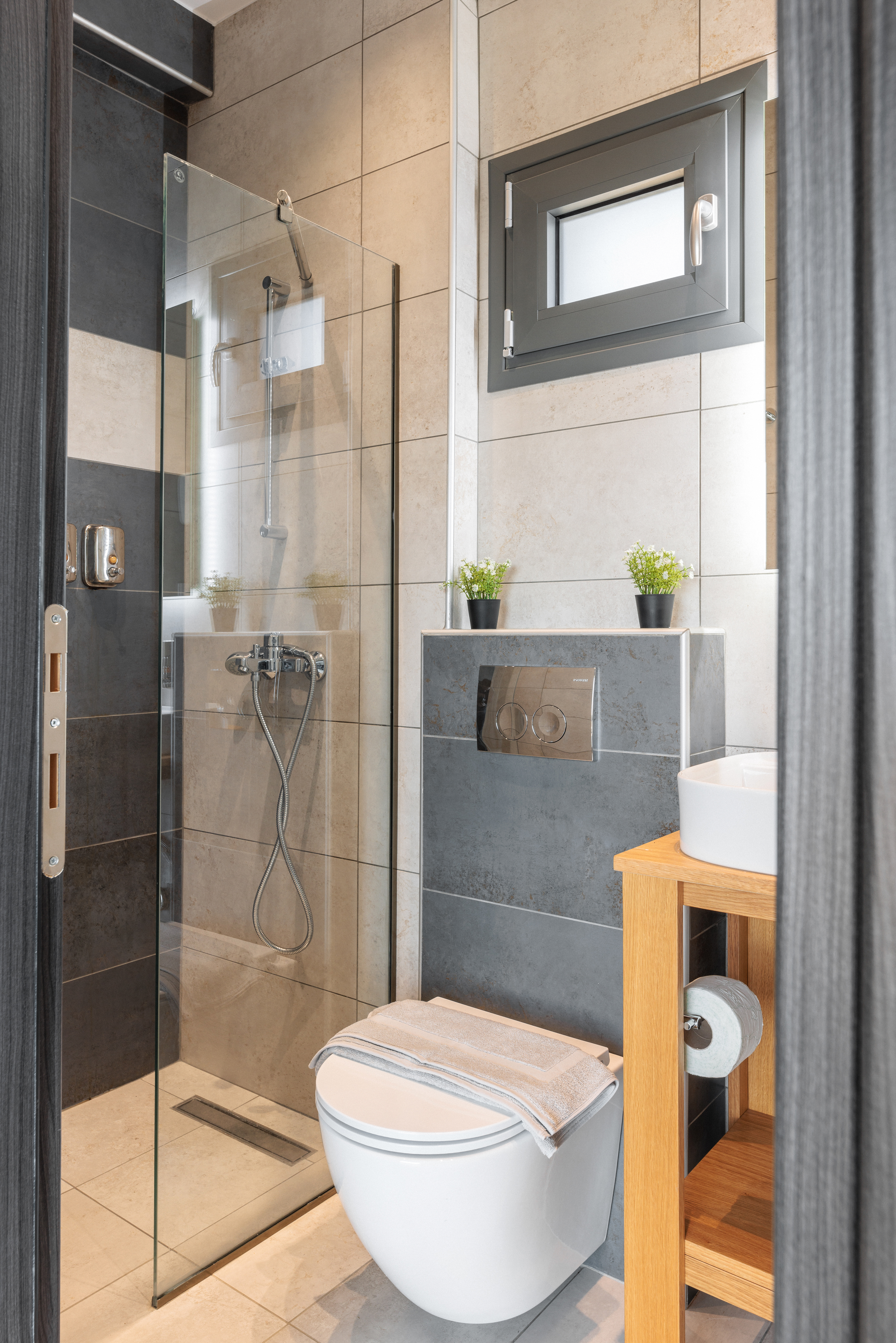 a bathroom with a shower unit