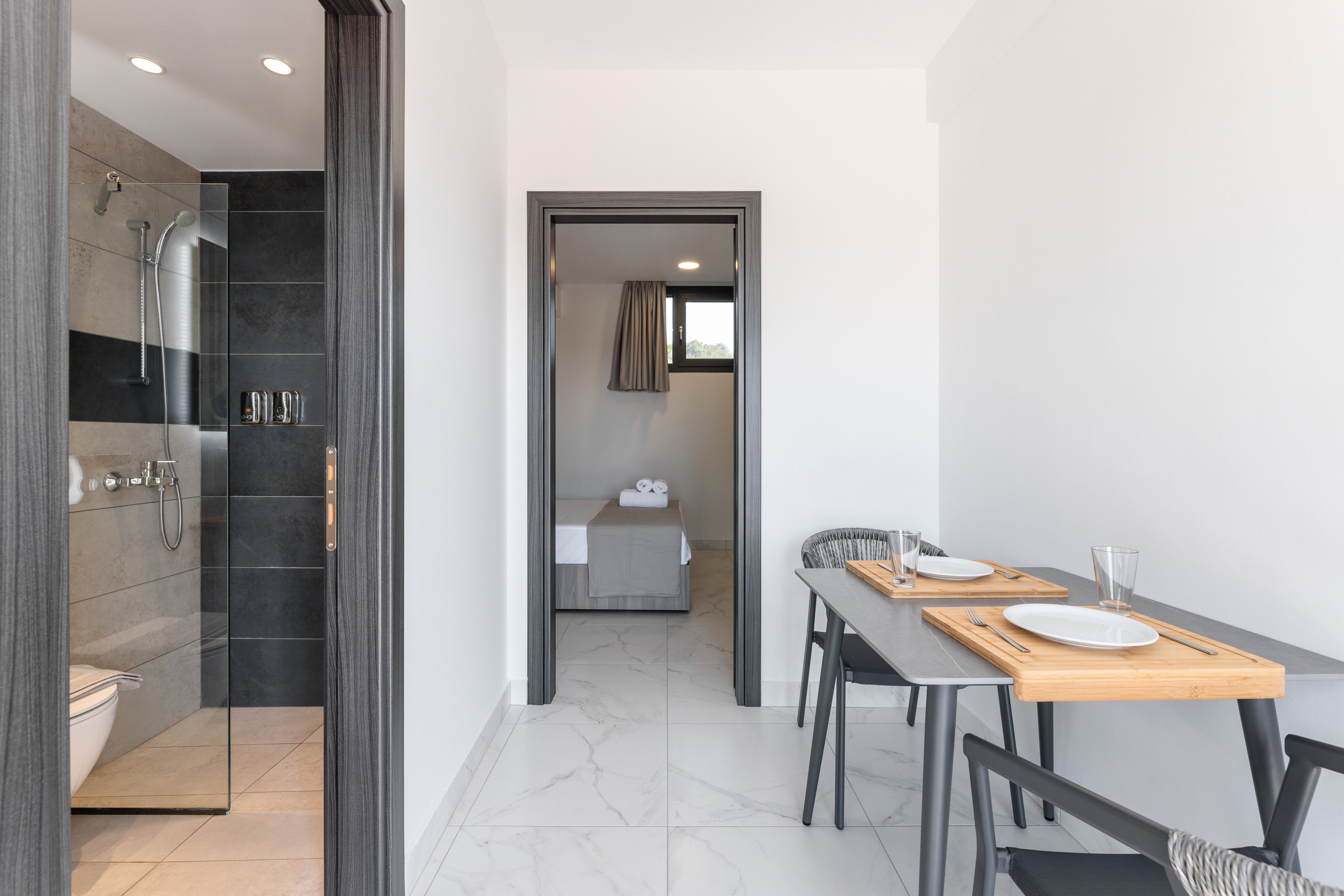 a room with a table and chairs