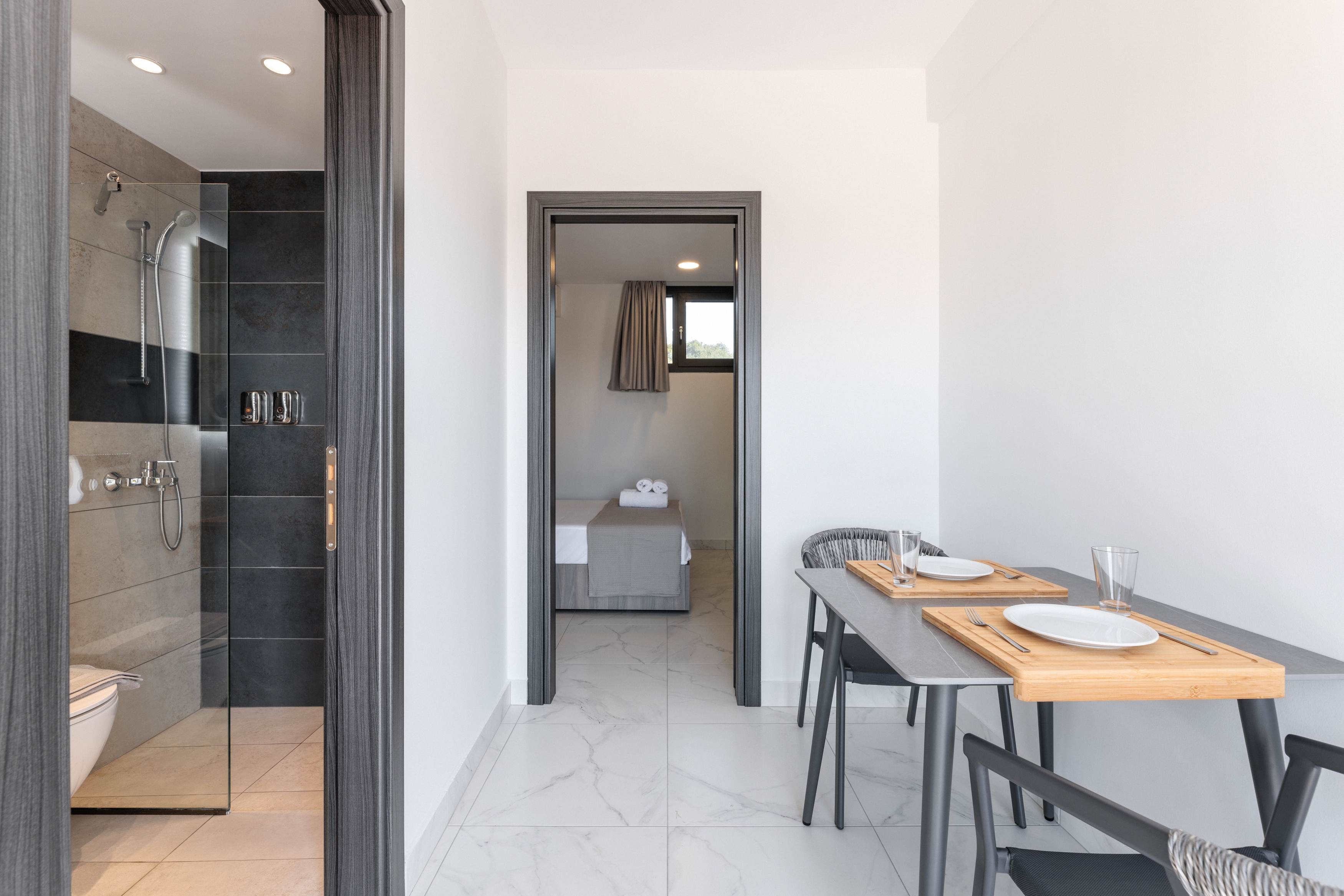 a room with a table and a mirror