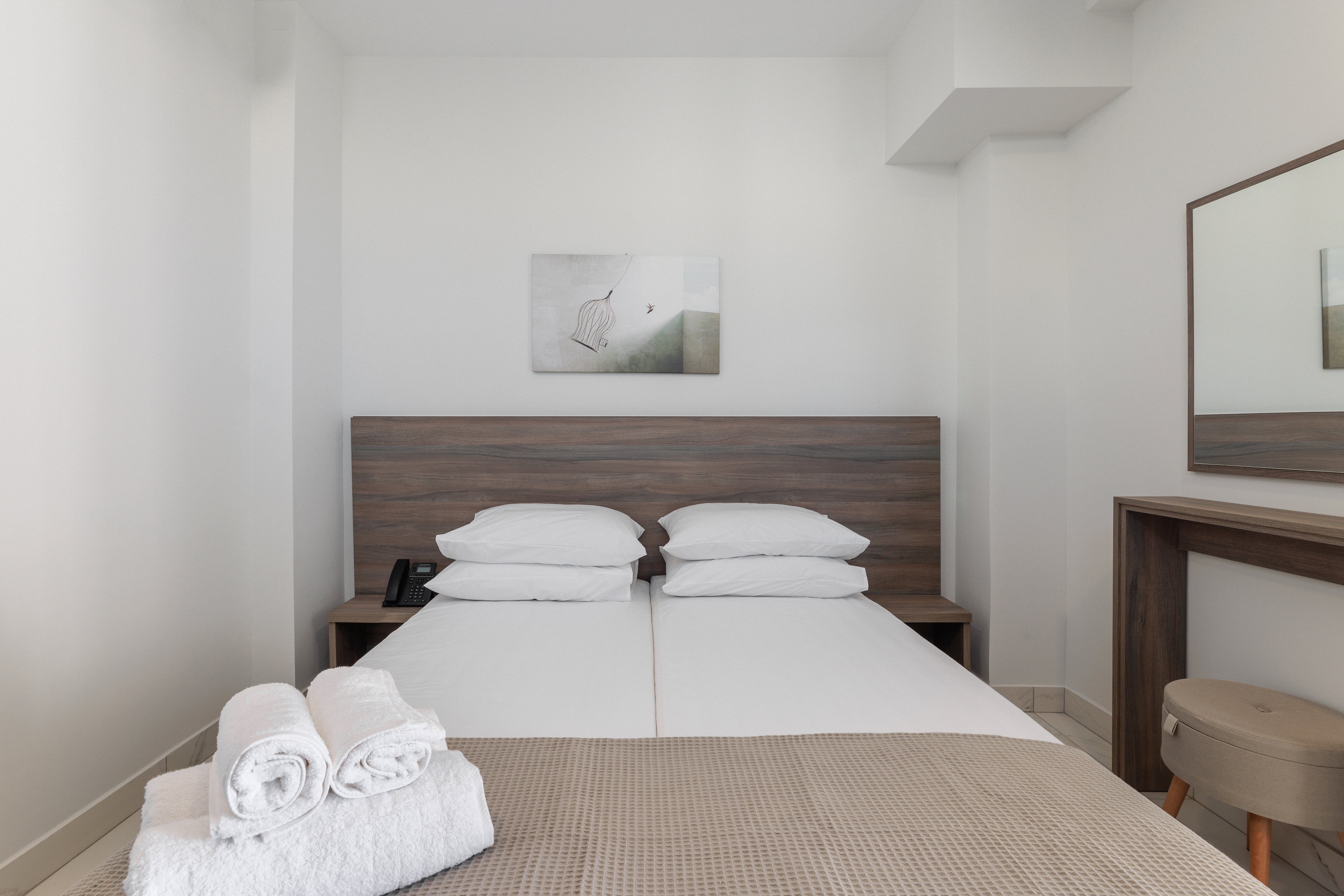 a bed with white sheets