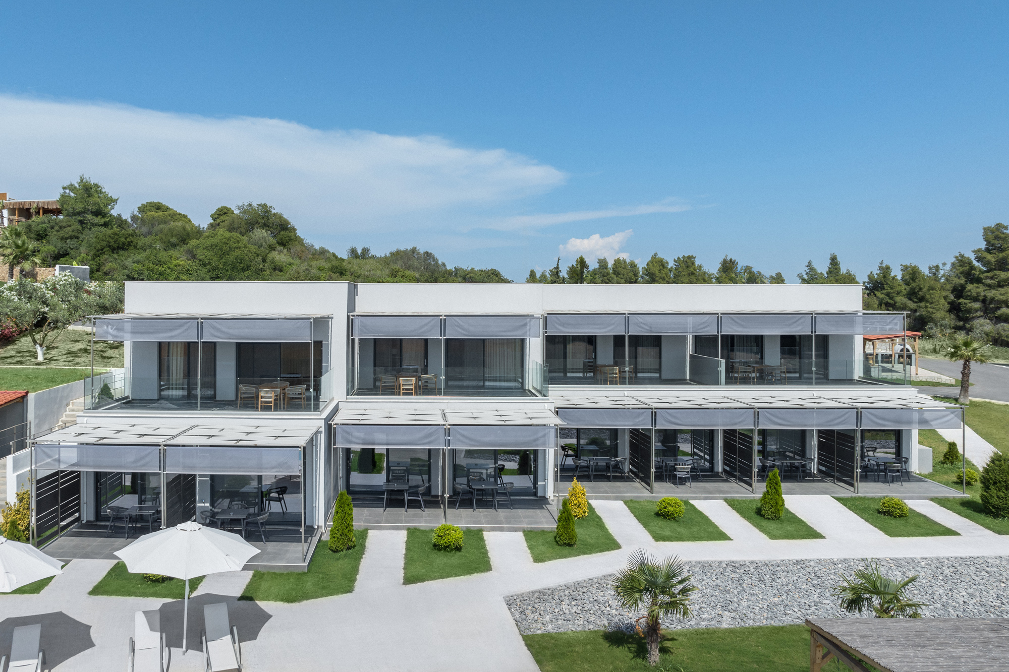 a building with a courtyard and trees
