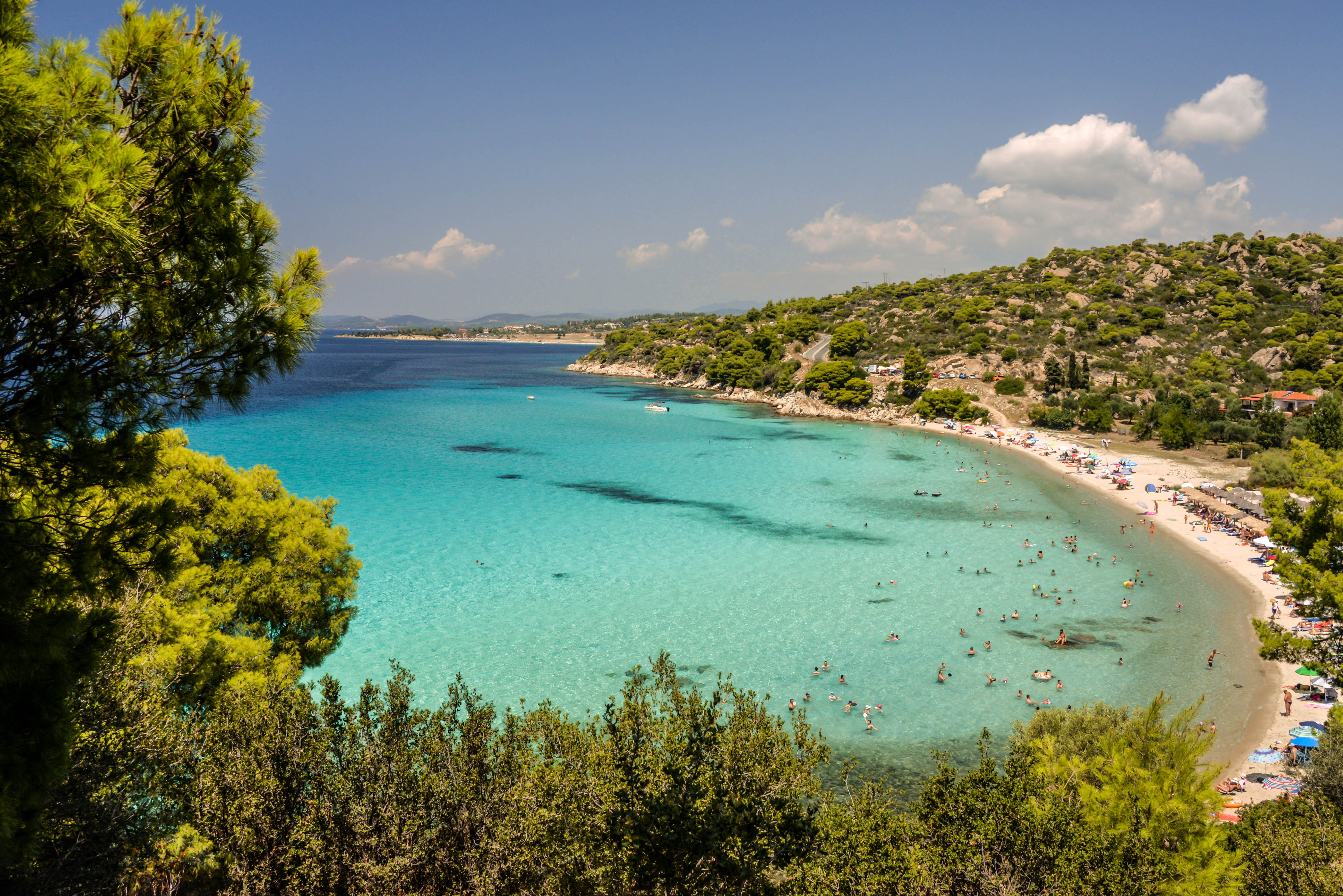 a beach with blue water